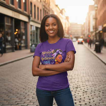 Woman wearing a purple t-shirt with a graphic design on a city street
